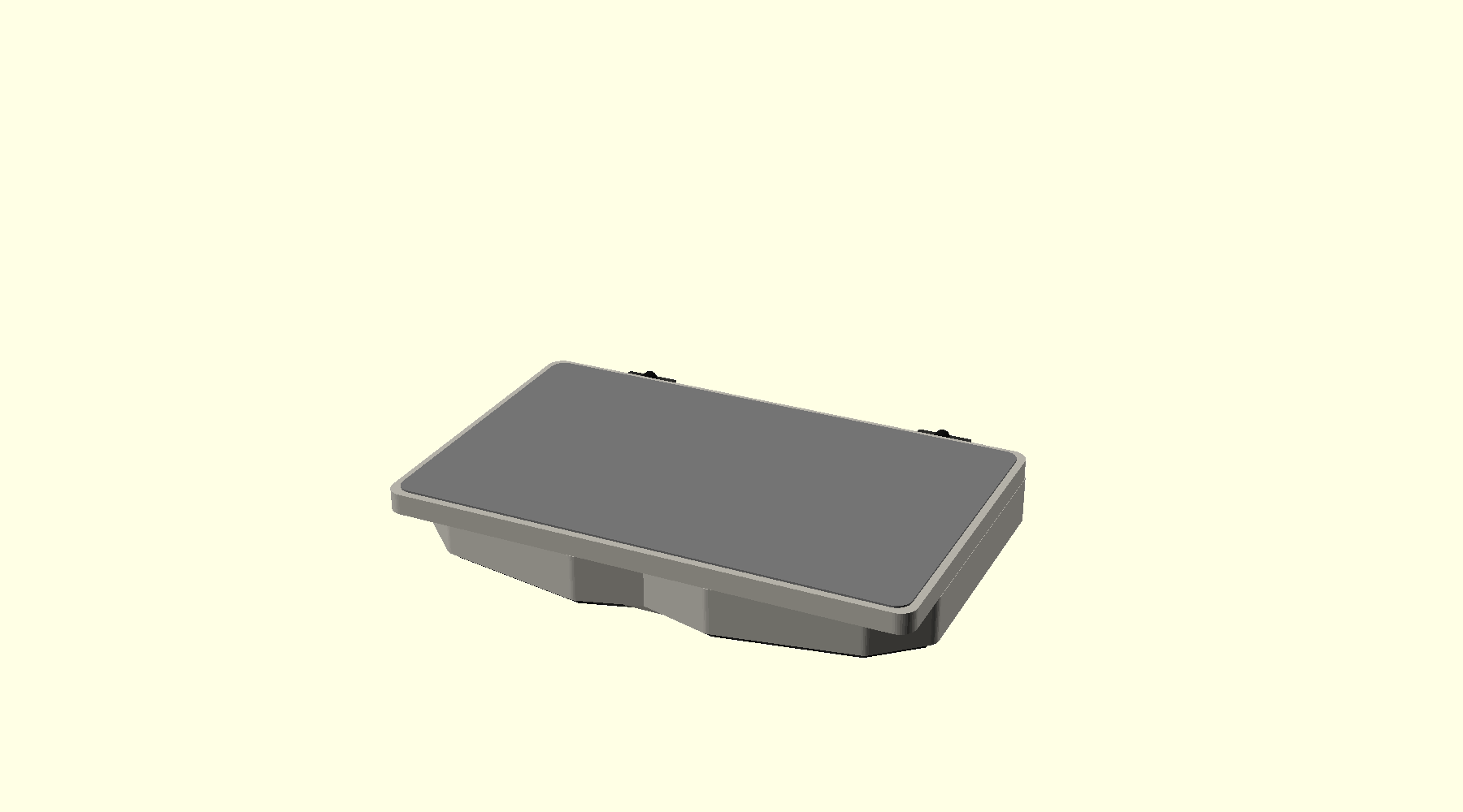 Closed rendering showing the compact clamshell envelope